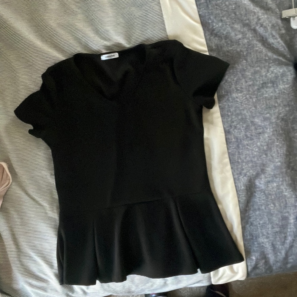 Medium black pemplum top